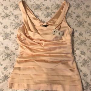 Express soft peach dressy tank.